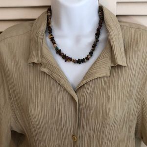 Women’s textured and pleated blouse